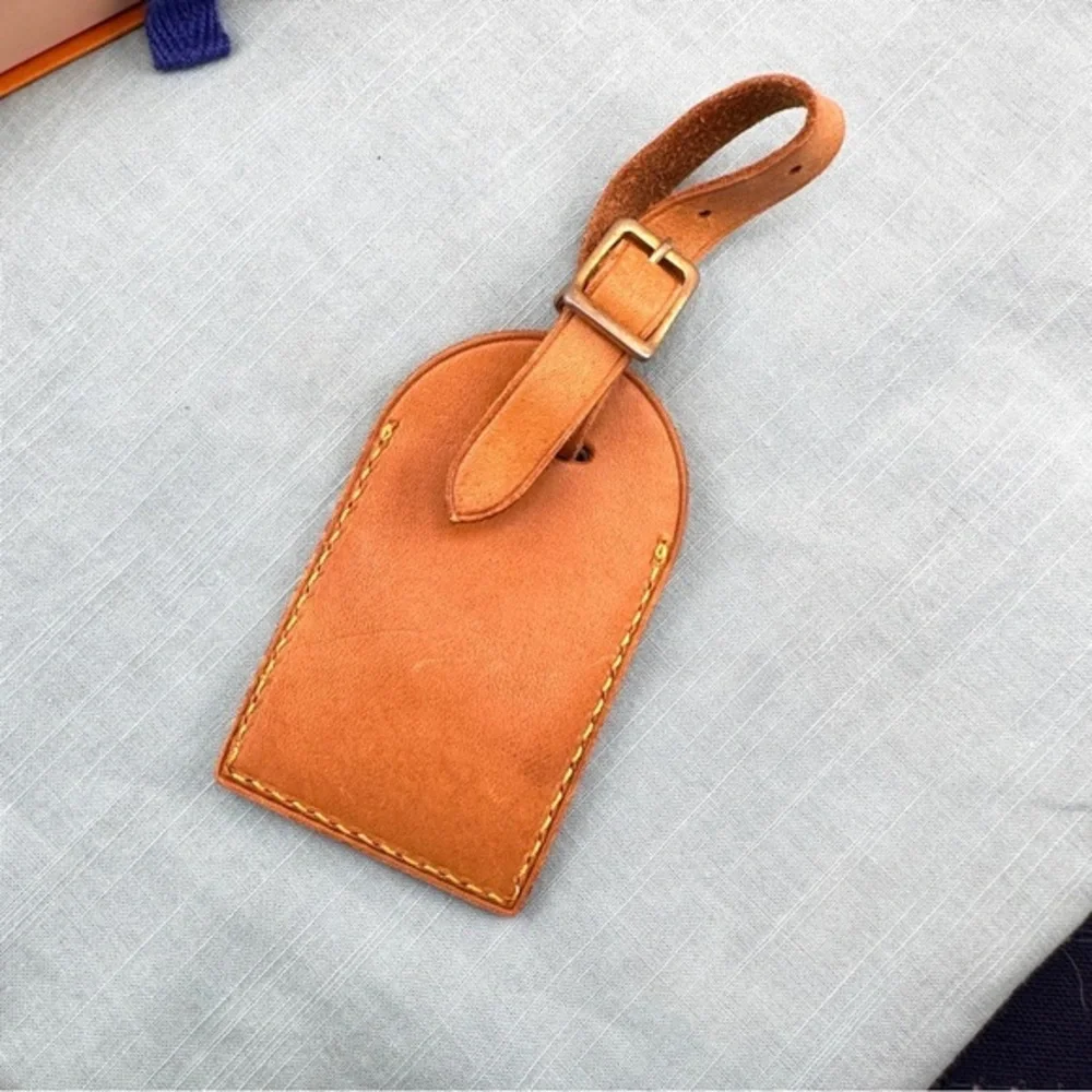 AUTHENTIC Vachetta Leather Luggage tag and loop.
